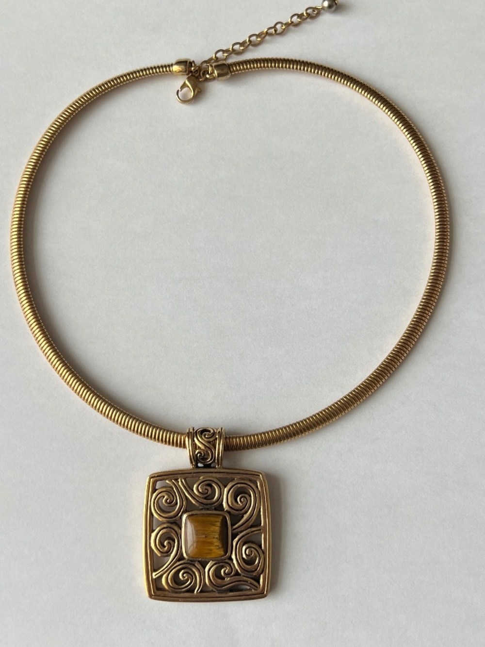 gold necklace with Tiger's Eye stone